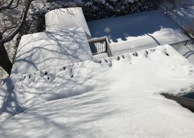 Toit de garage eneigé (déneigement de toiture) - Toiture-S. Beaumier à Laval